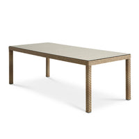 Cocos havebord fra Lexpo i naturfarvet polyrattan og med glas bordplade
