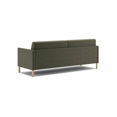Estrid sovesofa fra Favn Living i Sama stof i farven 335 Winter Moss