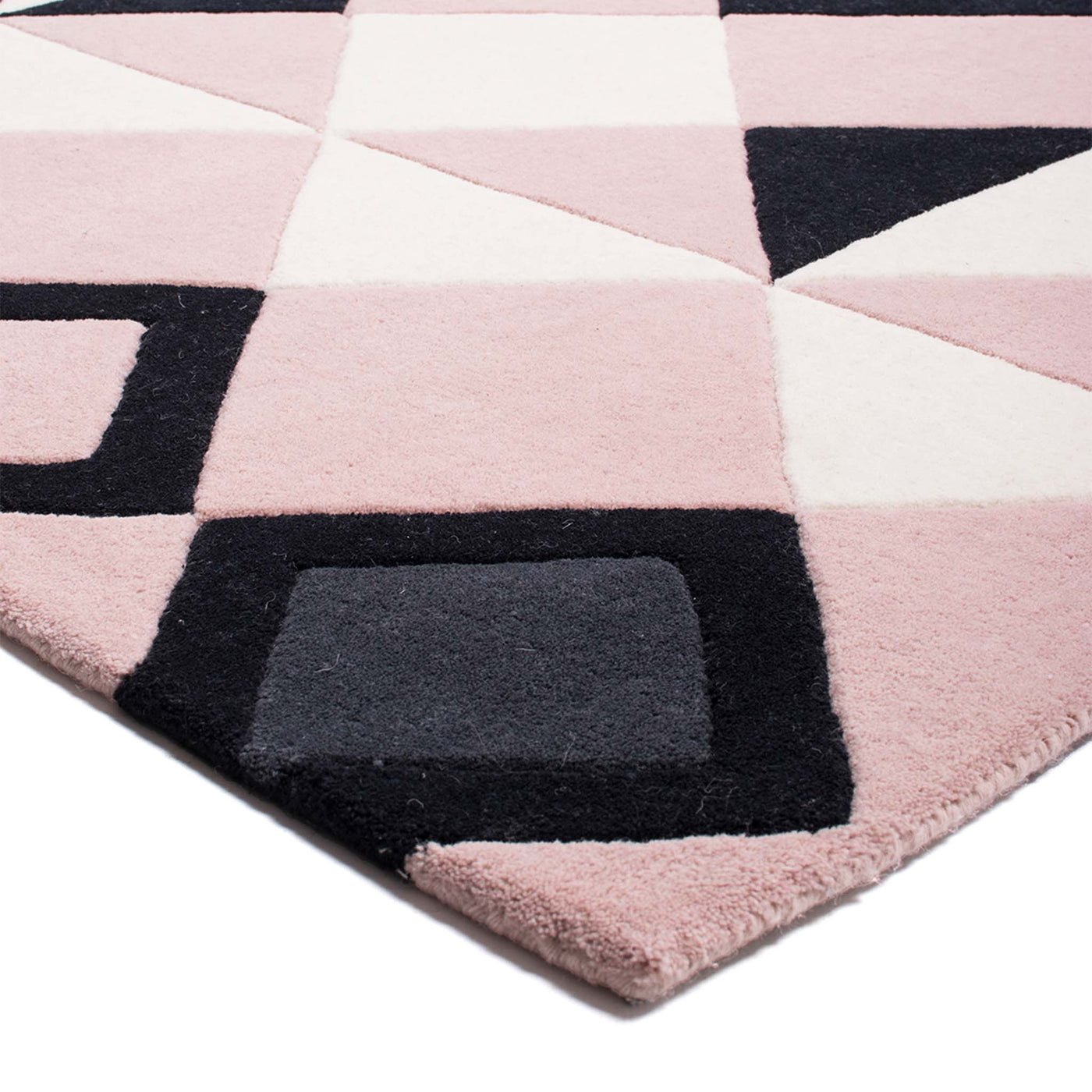 Odin håndtuftet tæppe i rosa fra HC Tæpper