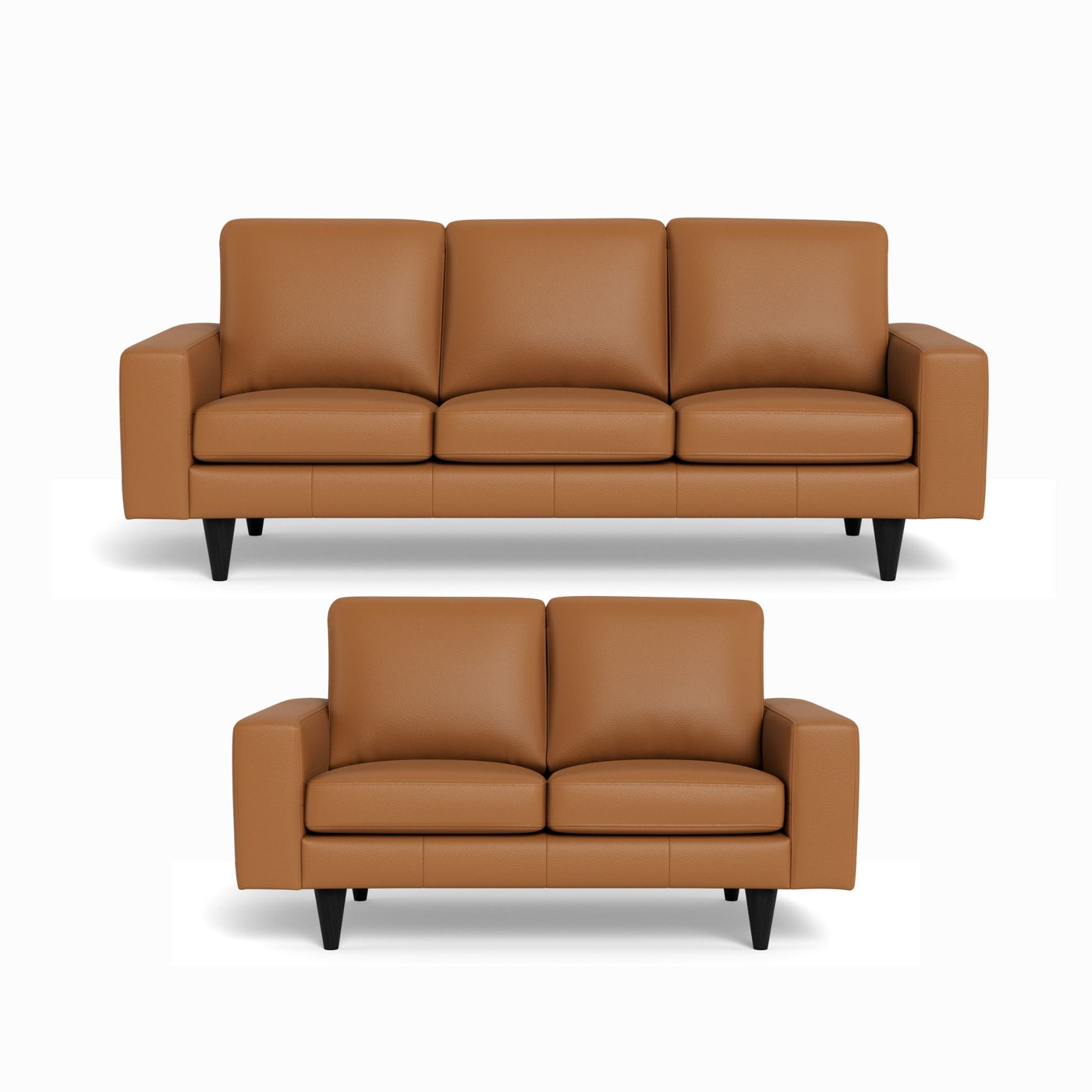 Skyline sofasæt fra Hjort Knudsen i cognac soleda læder og ben i sort eg. 