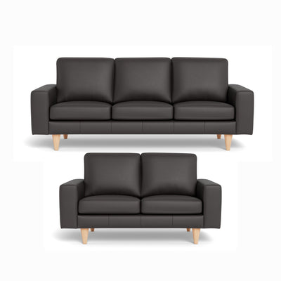 Skyline sofasæt fra Hjort Knudsen i mørkebrunt soleda læder og ben i hvidolieret eg. 