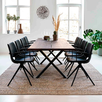 Cayman spisebordsstol i sort læder med stålben fra Canett Furniture