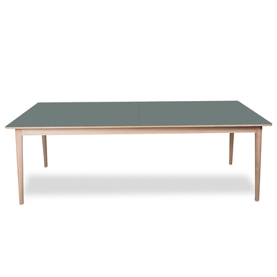 PBJ Designhouse Sesame spisebord i hvidpigmenteret lakeret eg med grøn nano laminat bordplade.