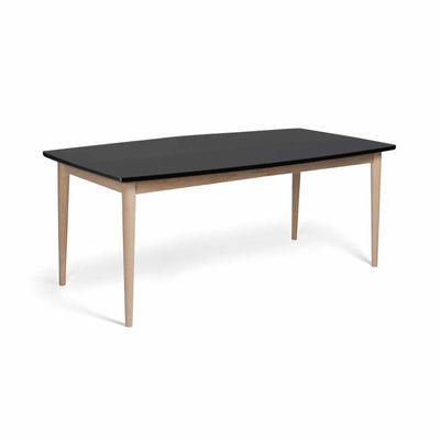 Svane Design bådformet Idyl spisebord med bordplade i sort nano laminat og ben i ubehandlet eg.