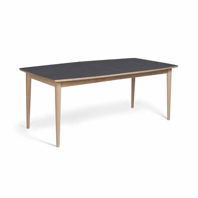 Svane Design bårdformet idyl spisebord med bordplade i stone look laminat og ben i ubehandlet eg.