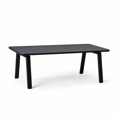 Svane Design Idyl sofabord 65 x 134 cm med bordplade i stone look laminat og ben i sortbejdset bøg.