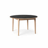 Svane Design Idyl spisebord Ø125 cm med bordplade i stone look laminat og ben i ubehandlet eg.
